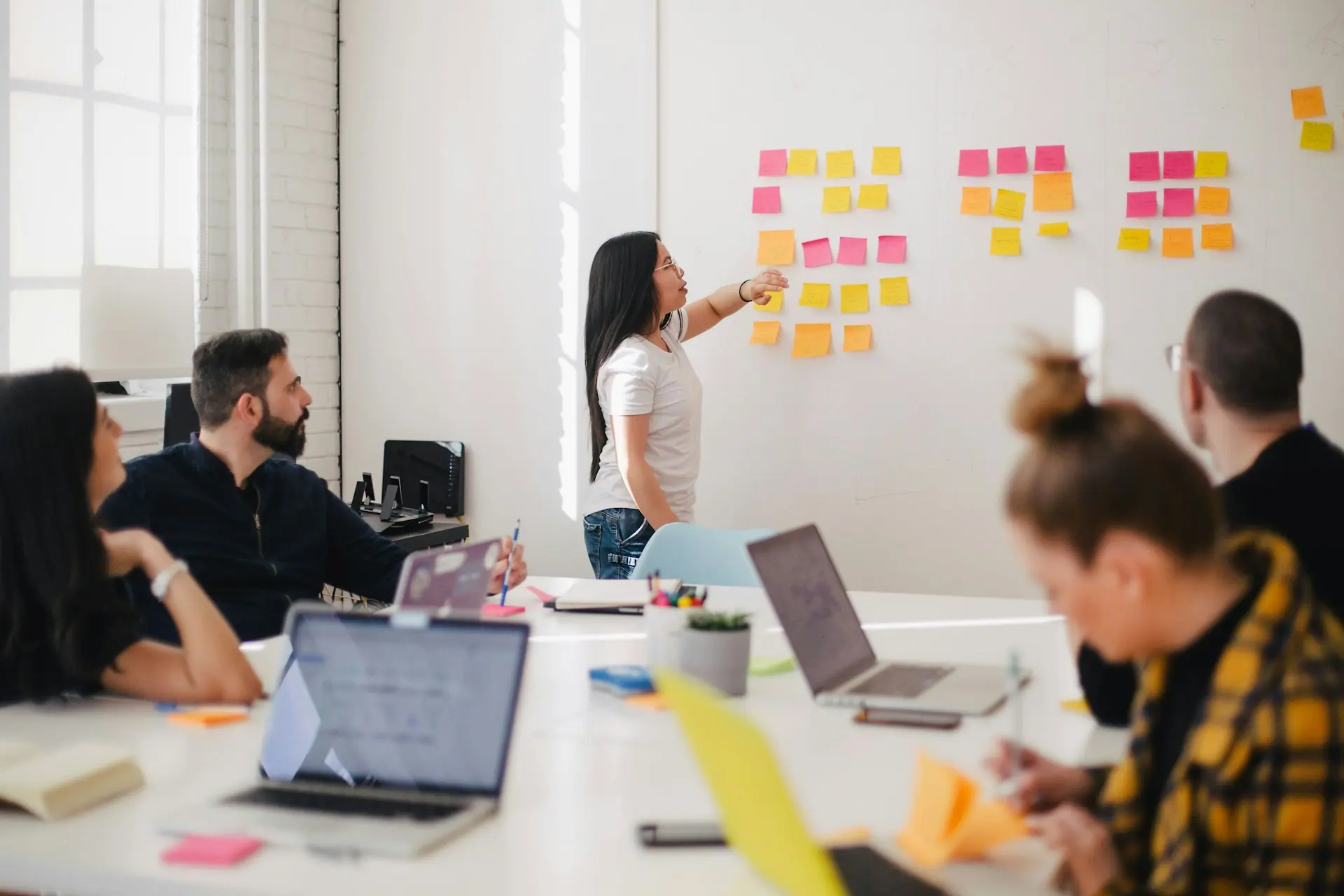 TrizenAI team collaborating in a bright modern office