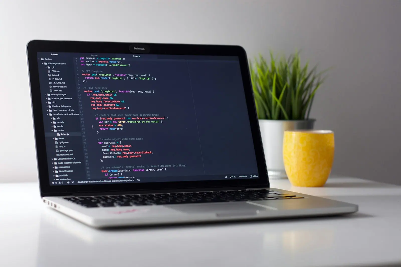 Source code open in an editor on a laptop