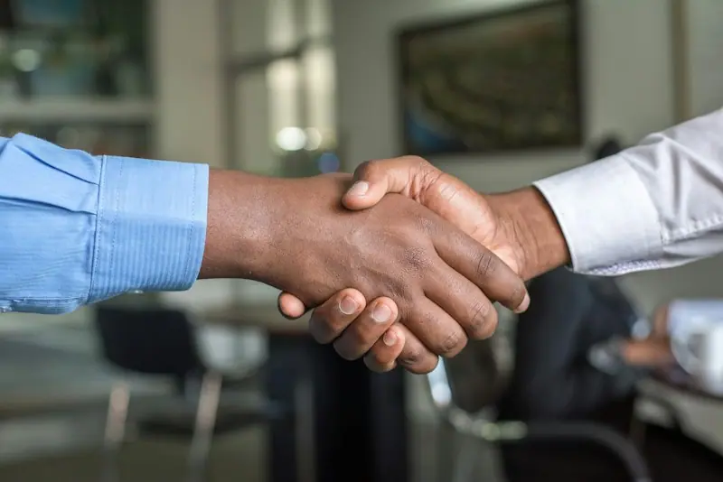 A handshake between two business partners